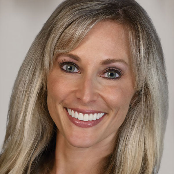 Cosmetic-Dentistry-bucket - Rochester Advanced Dentistry patient of Dr. Haddad shows off her cosmetic smile
